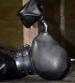 Leather bag, breath play, painful shocks